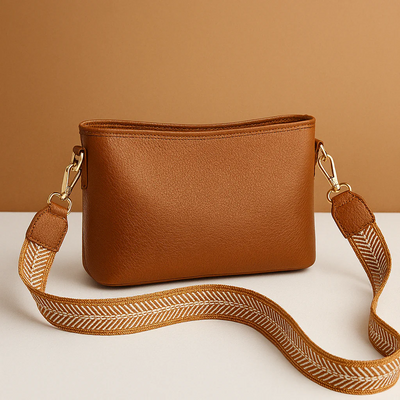 Modern sling bag with adjustable strap for women.