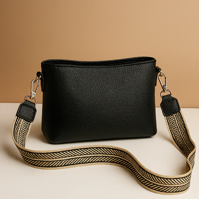 Modern sling bag with adjustable strap for women.